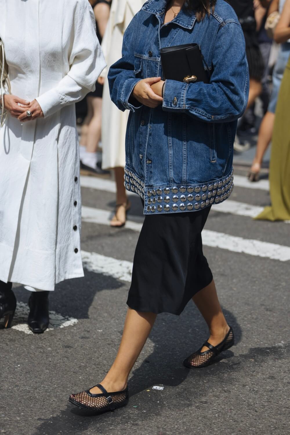 Khaite Studded Denim Jacket and Alaia Mesh Flats