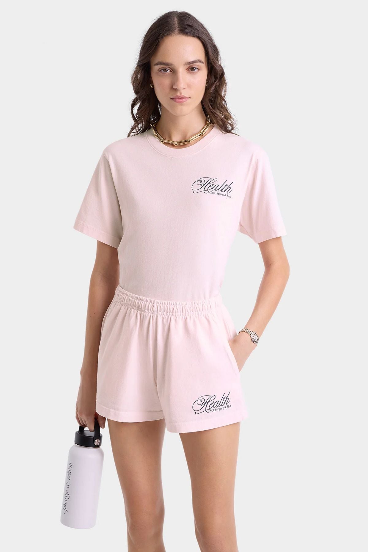 Sporty & Rich Health Script T-Shirt - Pink Dolphin