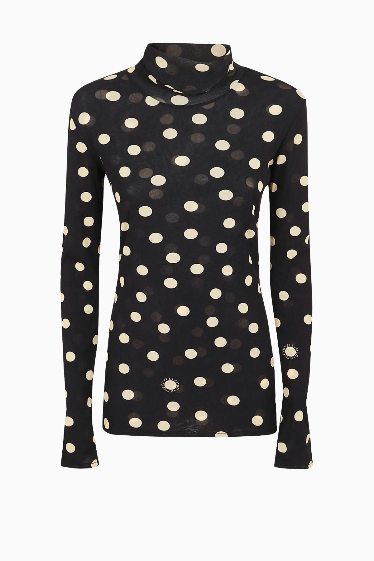 beige polka dot top
