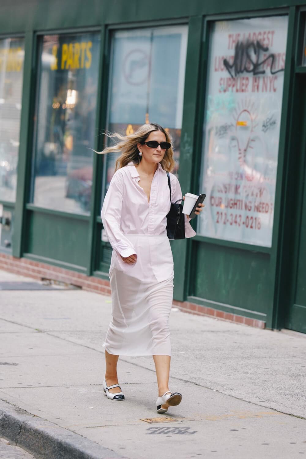 Woman Wearing Cotton shirt Tucked into sheer slip skirt