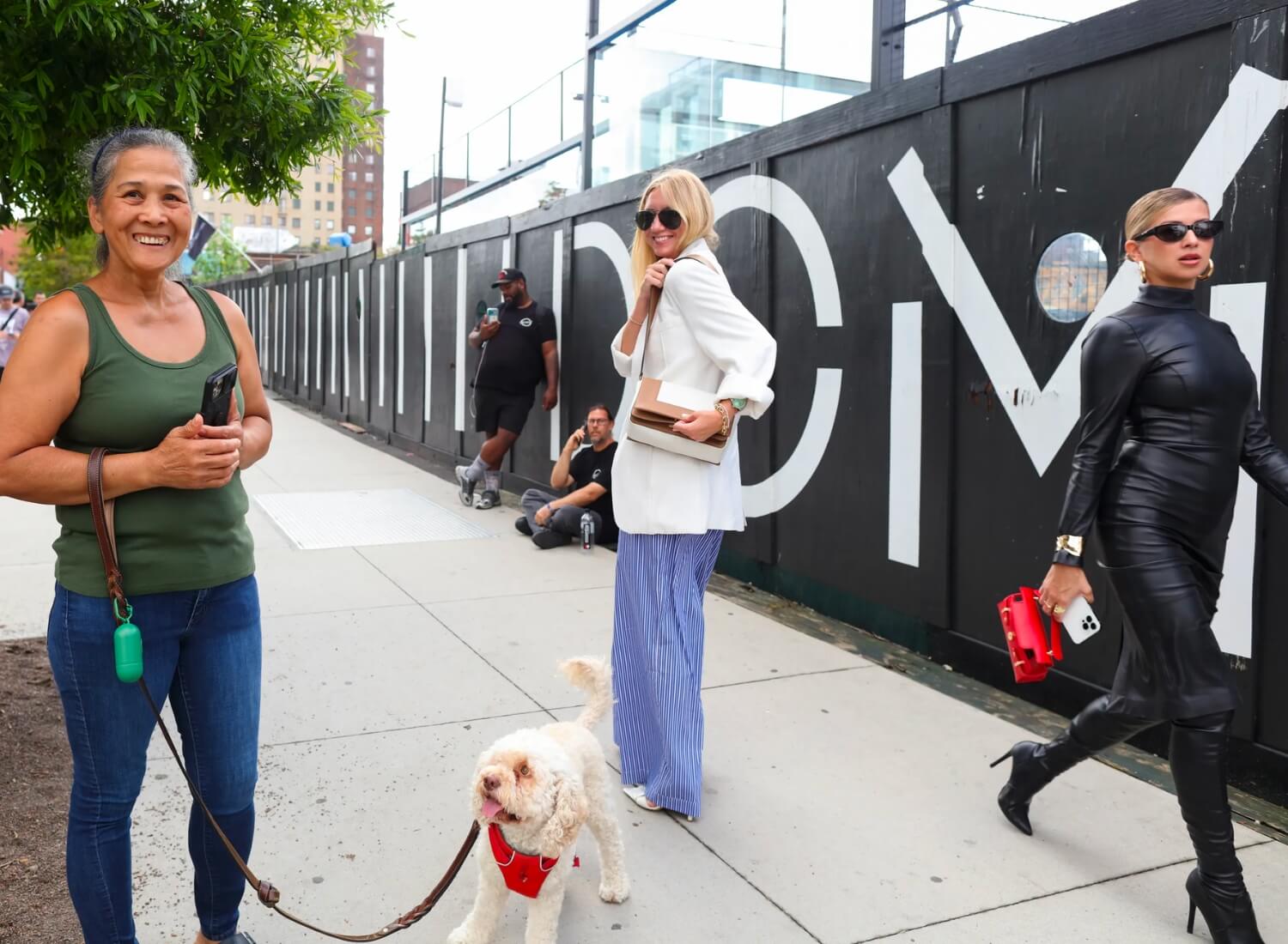 Lisa Aiken wearing a white blazer and striped trousers at New York Fashion Week