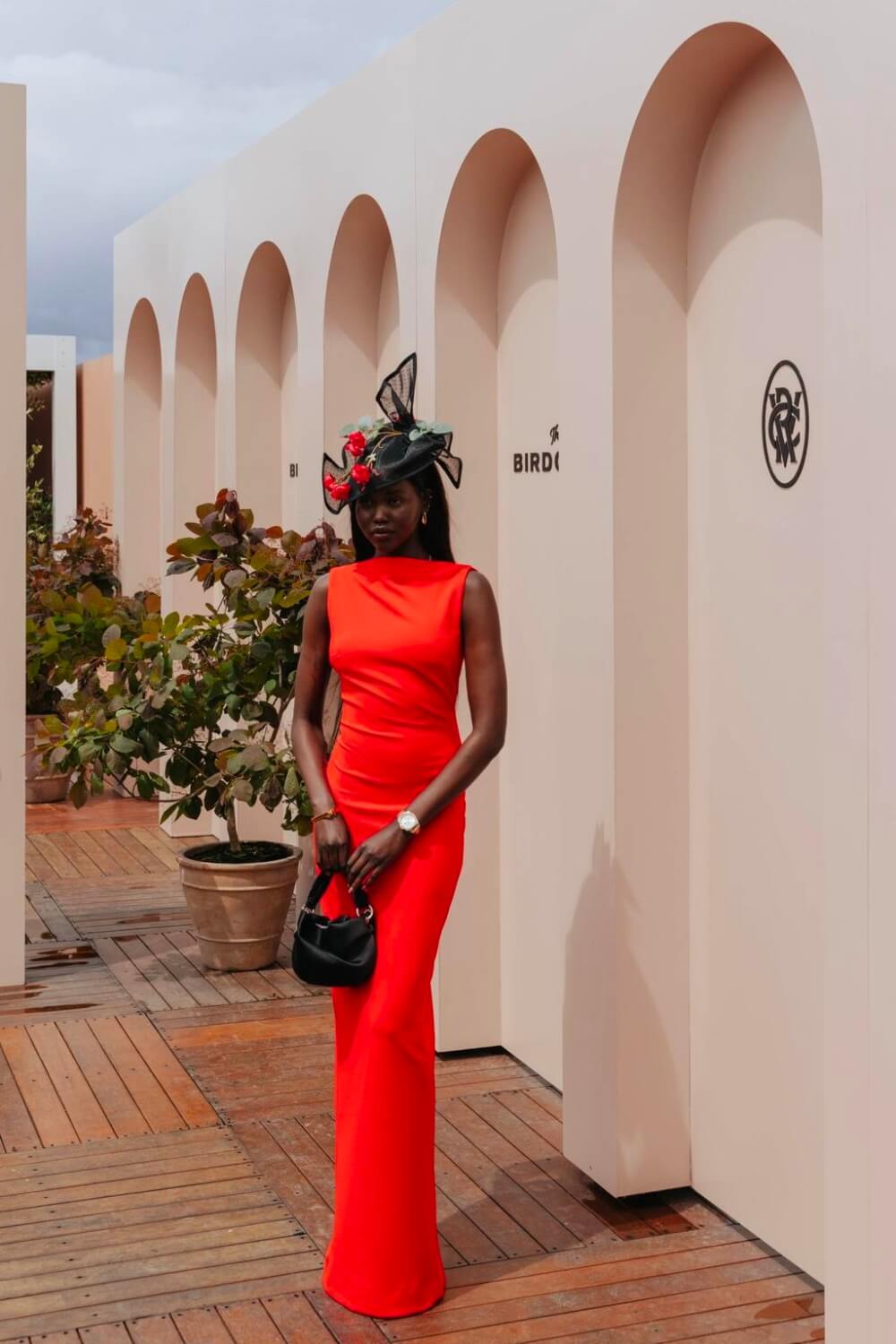 Woman in Red dress at Melbourne Cup Races